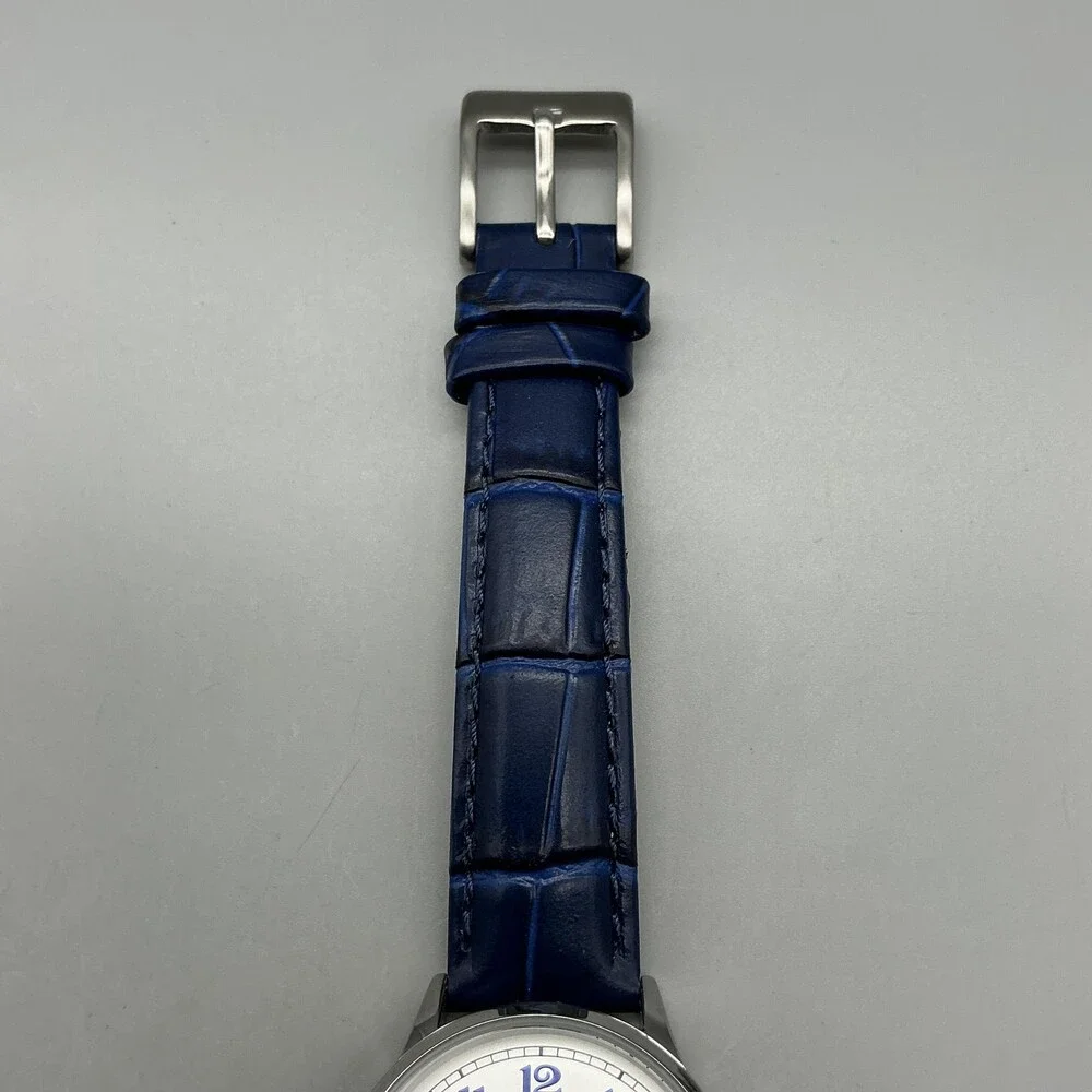 Shengke Womens Watch 32mm Silver Tone Blue Leather Band Date New Battery